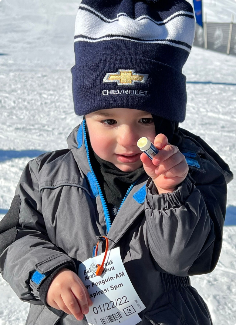 kid with a Chevrolet beanie