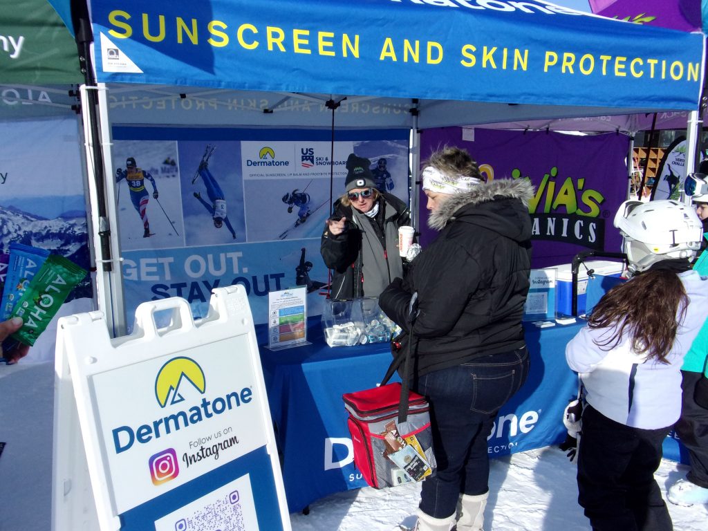 A woman samples suncreen, a key ski element A woman samples suncreen, a key ski element